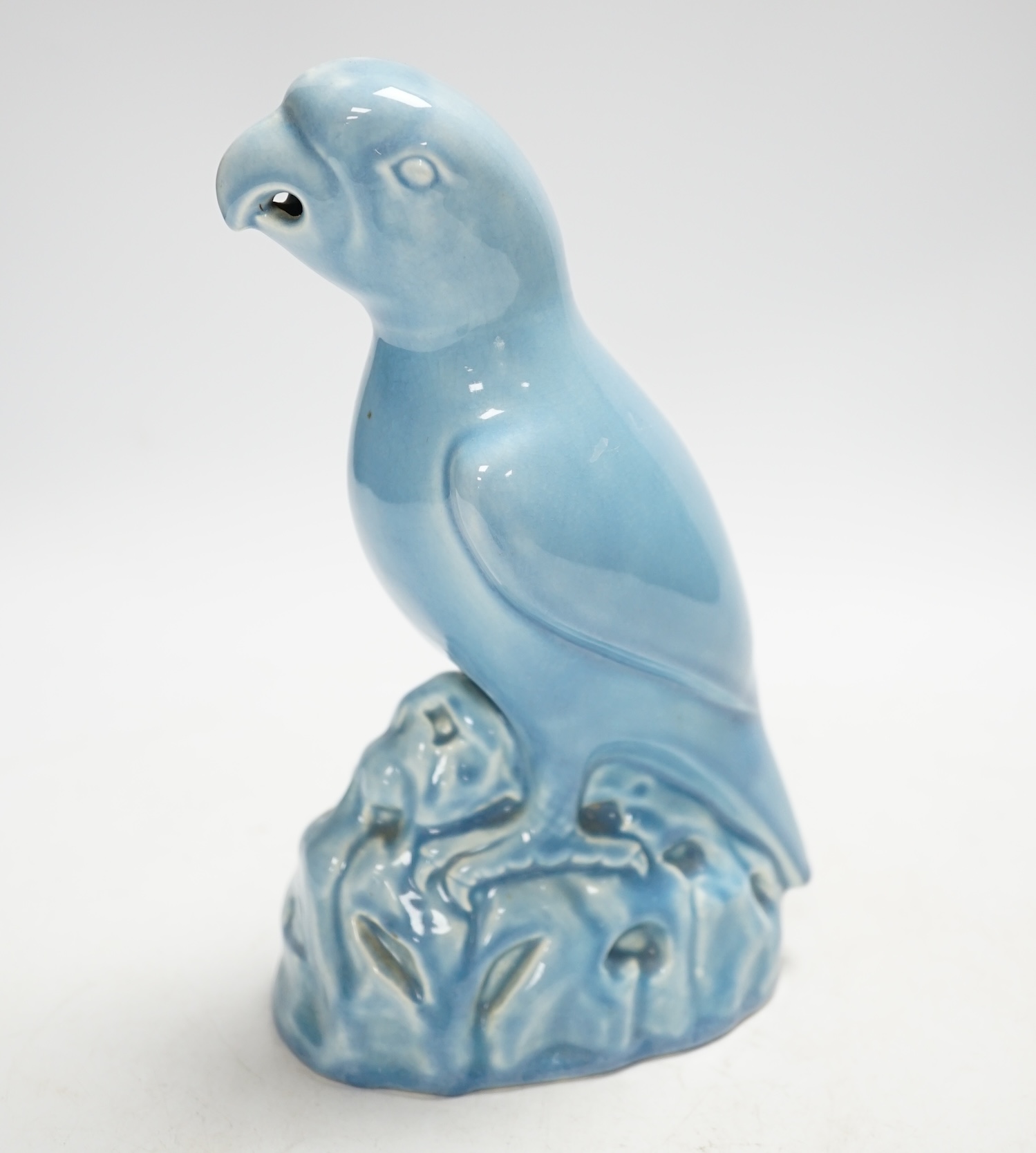 An Art Deco Mintons blue glazed parrot, 22cm high